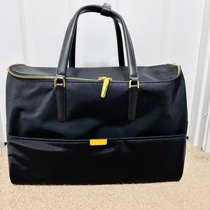Women’s Tumi travel bag